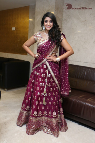 Telugu Actress Nakshatra photoshoot in a maroon saree