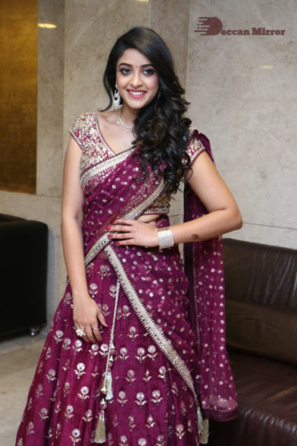 Telugu Actress Nakshatra photoshoot in a maroon saree
