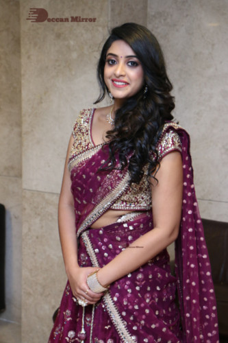 Telugu Actress Nakshatra photoshoot in a maroon saree