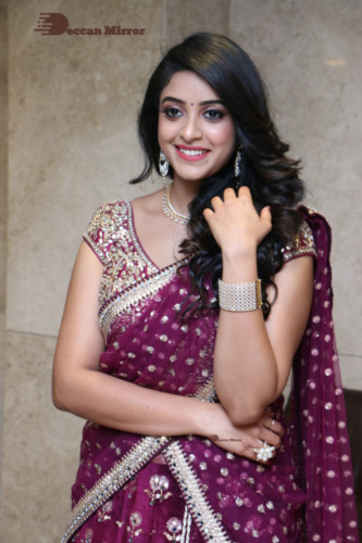 Telugu Actress Nakshatra photoshoot in a maroon saree