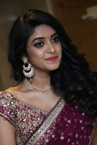Telugu Actress Nakshatra photoshoot in a maroon saree