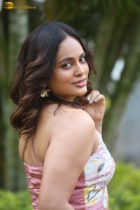 actress nandita swetha poses in a sleeveless blouse