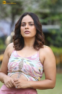 actress nandita swetha poses in a sleeveless blouse