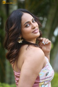 actress nandita swetha poses in a sleeveless blouse