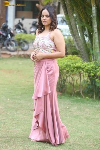 actress nandita swetha poses in a sleeveless blouse
