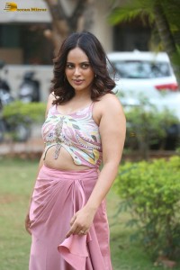 actress nandita swetha poses in a sleeveless blouse