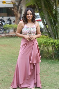 actress nandita swetha poses in a sleeveless blouse