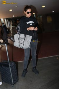 bollywood actress Nargis Fakhri glamorous looks in white hoodie and sunglasses