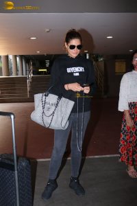 bollywood actress Nargis Fakhri glamorous looks in white hoodie and sunglasses
