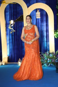 bollywood actress Nargis Fakhri beautiful in a orange dress