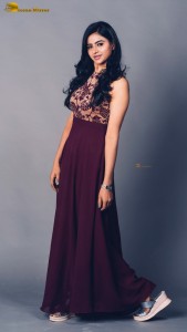actress Naveena Reddy sizzles in a maroon salwar