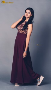 actress Naveena Reddy sizzles in a maroon salwar