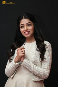 actress navya swamy in a white dress