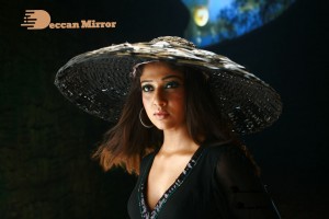 Nayanthara wearing a huge bamboo hat for a photoshoot