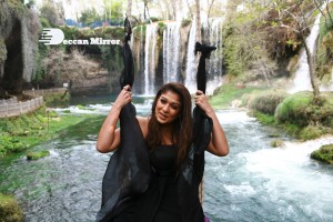 Nayanthara in a black shoulder less dress with loose hair