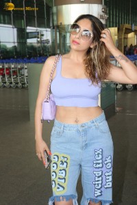 Neha Bhasin in a glamorous look at the Airport