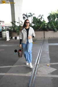 actress and model Neha Dhupia stylish looks at mumbai airport