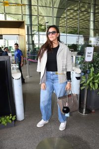 actress and model Neha Dhupia stylish looks at mumbai airport