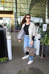 actress and model Neha Dhupia stylish looks at mumbai airport