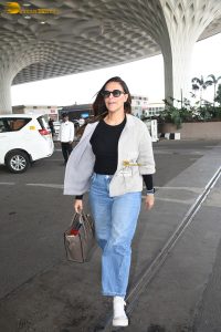 actress and model Neha Dhupia stylish looks at mumbai airport
