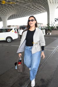 actress and model Neha Dhupia stylish looks at mumbai airport