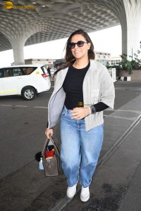 actress and model Neha Dhupia stylish looks at mumbai airport