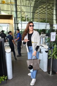 actress and model Neha Dhupia stylish looks at mumbai airport