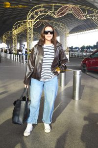 bollywood actress Neha Dhupia fashionable in a leather jacket and sunglasses
