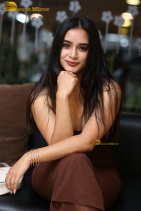 actress neha krishna gorgeous in a brown dress