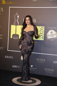 actress neha sharma dazzles at a movie event in a black dress