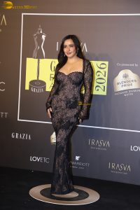 actress neha sharma dazzles at a movie event in a black dress