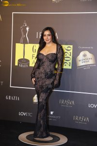 actress neha sharma dazzles at a movie event in a black dress