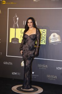 actress neha sharma dazzles at a movie event in a black dress