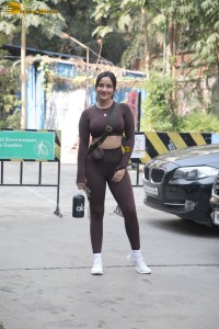Actress sisters Neha Sharma and Aisha Sharma pose for pictures after a gym workout