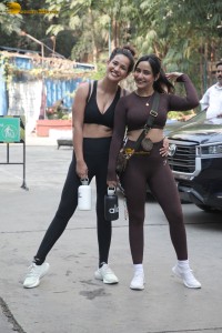 Actress sisters Neha Sharma and Aisha Sharma pose for pictures after a gym workout
