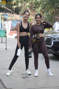 Actress sisters Neha Sharma and Aisha Sharma pose for pictures after a gym workout
