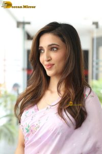 tollywood actress neha shetty pretty in a pink saree