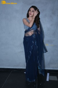 Telugu Actress Neha Shetty in a dark blue saree