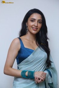 actress Neha Shetty ravishing looks in a blue saree
