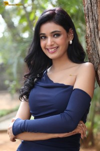 actress Neha Solanki beautiful in a shoulderless blue dress