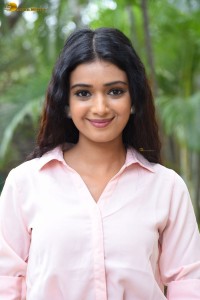 actress Neha Solanki gorgeous in a pink shirt and yellow skirt