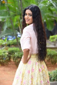 actress Neha Solanki gorgeous in a pink shirt and yellow skirt