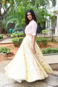 actress Neha Solanki gorgeous in a pink shirt and yellow skirt