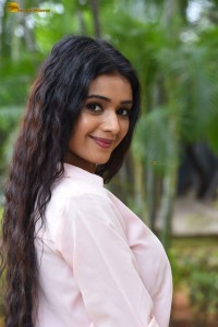 actress Neha Solanki gorgeous in a pink shirt and yellow skirt