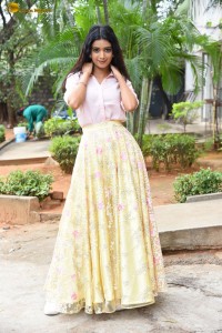 actress Neha Solanki gorgeous in a pink shirt and yellow skirt