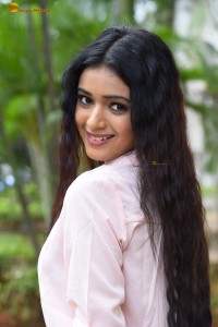 actress Neha Solanki gorgeous in a pink shirt and yellow skirt