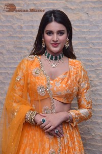 Actress Nidhhi Agerwal in a orange Lehenga Choli Dress