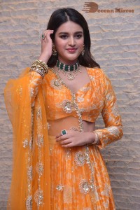 Actress Nidhhi Agerwal in a orange Lehenga Choli Dress