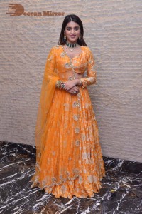 Actress Nidhhi Agerwal in a orange Lehenga Choli Dress