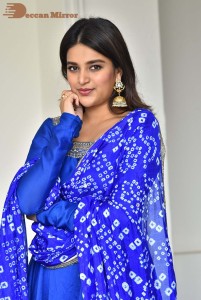 Nidhhi Agerwal in a blue salwar kameez dress